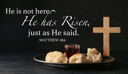Text HE IS NOT HERE. HE IS RISEN, JUST AS HE SAID with glass of wine, bread and cross on dark background - obrazy, fototapety, plakaty