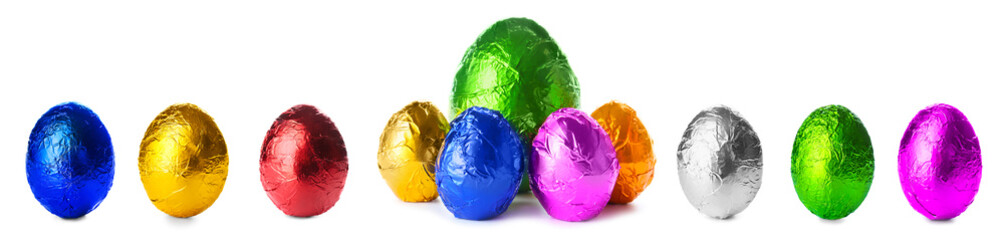 Set of bright chocolate eggs on white background