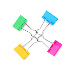 Colorful binder clips on white background