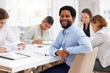 Happy black man, portrait and business meeting with team, management and staff in office for company workshop. Smile, motivation and male worker in startup, collaboration and corporate opportunity