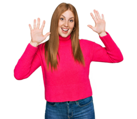 Young irish woman wearing casual clothes showing and pointing up with fingers number ten while smiling confident and happy.