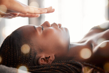 Black woman, relax and reiki spa treatment of a young female ready for facial. Skincare, beauty and...