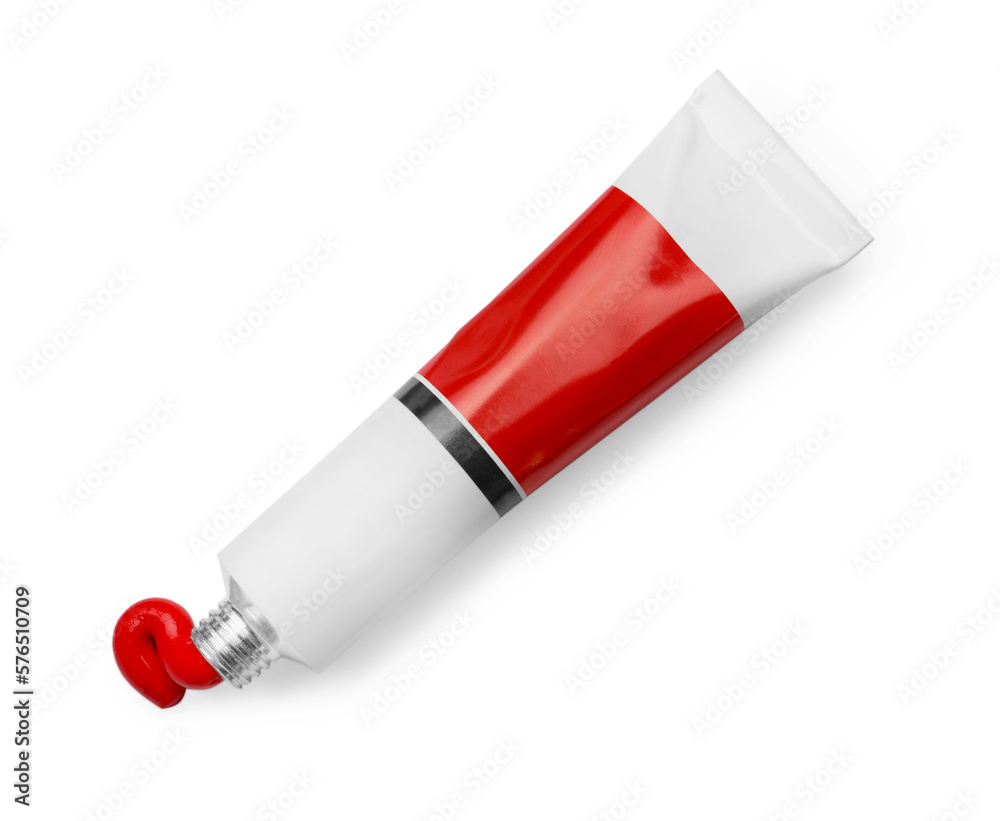 Wall mural Tube with red oil paint on white background, top view