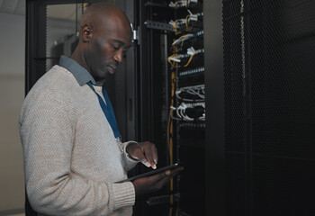 Engineer, server room or black man with tablet for database connection cable, maintenance or software update at night. Cybersecurity, IT and male coder with technology for networking in data center.