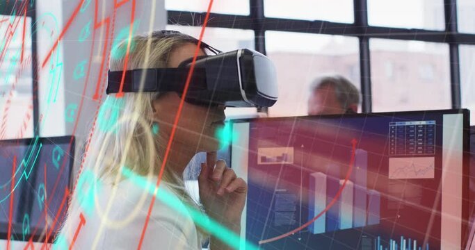 Animation of data processing over caucasian businesswoman using vr headset in office