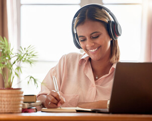 Woman, student with laptop and headphone, writing notes in notebook, education and study elearning course. Mexican female smile, internet and technology, online class with webinar and studying