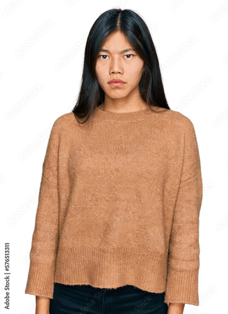 Poster Beautiful young asian woman wearing casual winter sweater skeptic and nervous, frowning upset because of problem. negative person.