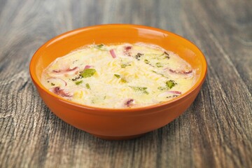 Delicious hot soup dish in plate