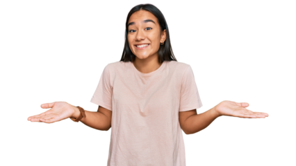 Young asian woman wearing casual clothes clueless and confused expression with arms and hands raised. doubt concept.