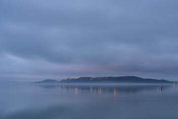 Tihany peninsula on a foggy winter day from Balatonfured