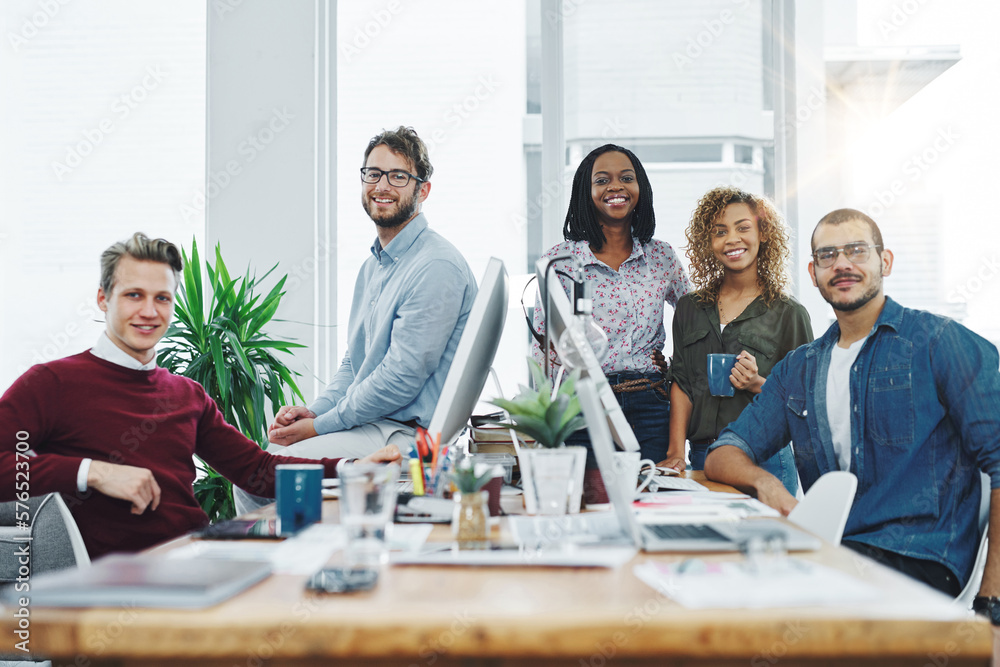 Aufkleber Go get that business growth. Portrait of a team of young go getters working in a modern office.