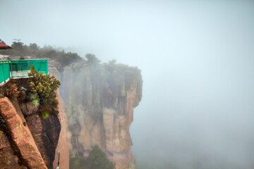 cliff in foggy day in copper canyon, divisadero chihuahua 
