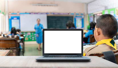 Fototapeta na wymiar Background image of opened laptop with blank white screen on teachers desk in school auditorium, copy space