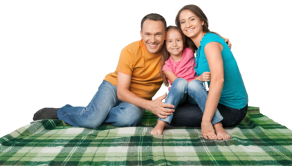 Happy smiling family with daughter looking at camera