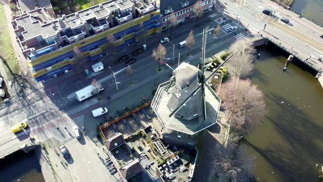 Amsterdam, Netherlands: drone view city 4K. Mill, Canals, Bridges, Dutch Buildings 2023