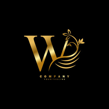 Gold luxury W letter logo with beautiful floral and feather ornament. feather logo.  W typography, W monogram. Suitable for business logos, brands, companies, boutiques, beauty logos, etc