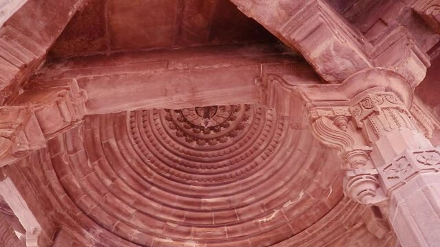 ancient hindu temple dome inside architecture from unique angle at day shot taken at mandore garden jodhpur rajasthan india.