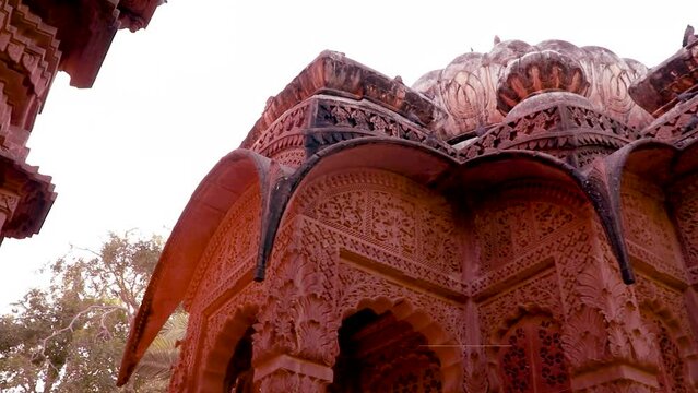red stone ancient hindu temple architecture from unique angle at day