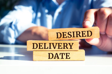 Close up on businessman holding a wooden block with 