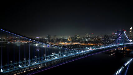Ben Franklin Bridge and Skyline of Philadelphia at night - aerial view - drone photography