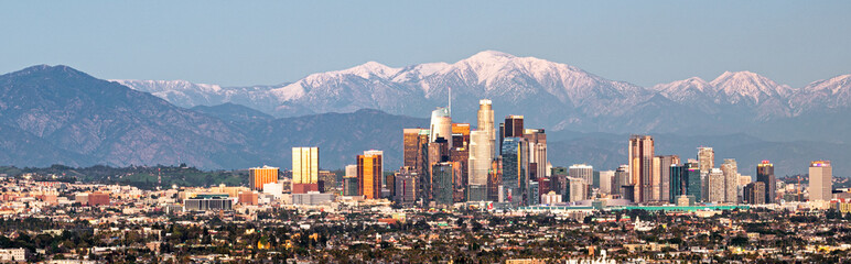 snowy mountains behind Downtown LA