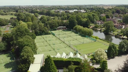 4k Panning Drone Shot of Warwick Tennis Club Courts and the River Avon in the Market Town of Warwick, Warwickshire.