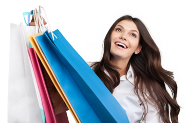 Young smiling woman holding shopping bags and a credit card