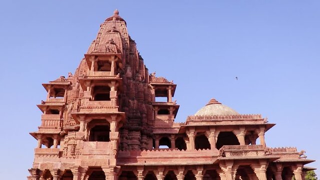 red stone ancient hindu temple architecture from unique angle at day