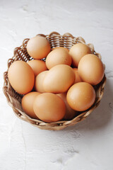 close up of eggs in a bowl.