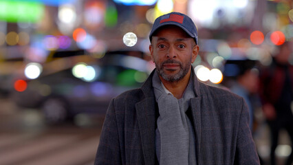Fototapeta premium Afro-American Man in the streets of New York at Times Square - travel photography