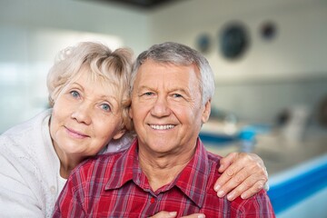 Happy old couple together have fun at home