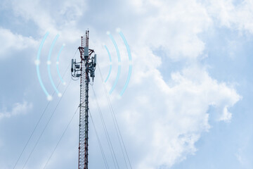 Obraz premium Telecommunication tower with blue sky and white cloud background, communication concept