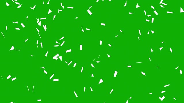 Falling white confetti particles on green screen background
