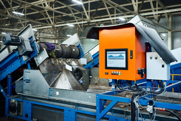 Control panel of production line in recycling plant workshop