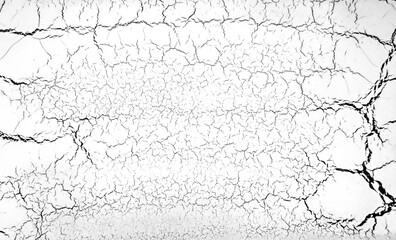 黒いひびの入った白い壁のテクスチャ