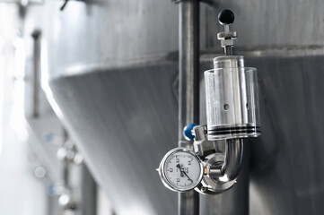pressure gauges for measuring pressure in beer tanks at a modern brewery