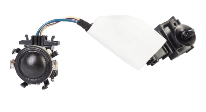 speaker of an acoustic system - an audio for playing music in a car interior on a white isolated background in a photo studio. Spare parts for auto repair in a workshop or for sale for tuning