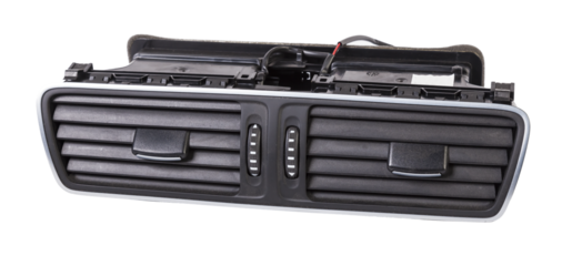 A close-up view of a part of the interior of a modern car with a view of the ventilation deflector of the heater for heating and cooling the passenger compartment. Used auto part catalog from junkyard
