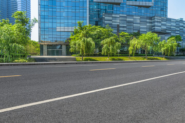Obraz premium empty road with modern buildings on background, shanghai, china..