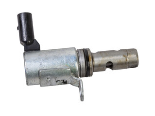 Electromagnetic crankshaft position sensor of a car engine in the hands of an auto mechanic. Spare...