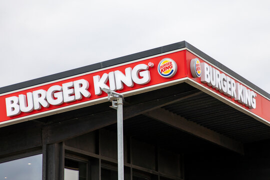 Burger King restaurant brand sign text and logo facade us fast food restaurant chain franchise