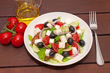 Greek salad with fresh vegetables closeup