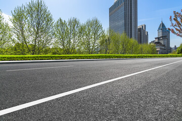 empty urban road with modern building in the city.