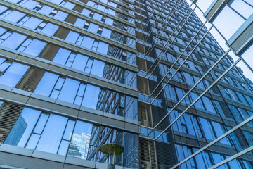 Obraz premium Urban abstract - windowed corner of office building.