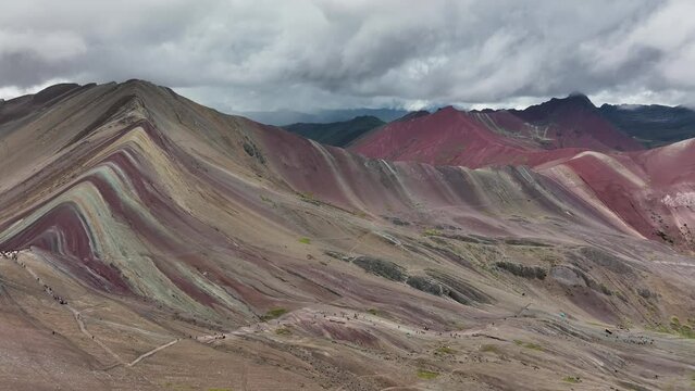Aerial fly drone view of  Rainbow Mountain (Montana de Siete Colores), Vinicunca, Cusco Region, Peru.