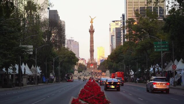 Beautiful architecture in downtown Mexico City at sunset. Slow motion steadicam footage.