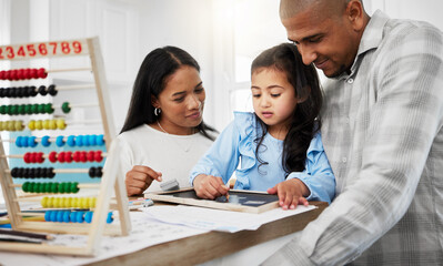 Fototapeta premium Education, couple and kindergarten girl drawing, coloring and writing together on kitchen counter. Homework, homeschool and man with woman and child teaching, learning and helping with home school.
