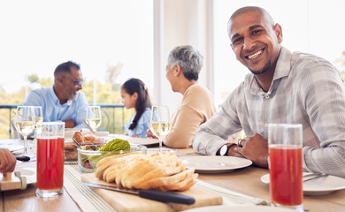 Food, portrait and man at happy family brunch, lunch and celebration event for reunion, bonding and enjoy quality time together. Love smile, happiness and group of people eating meal at Mexico home