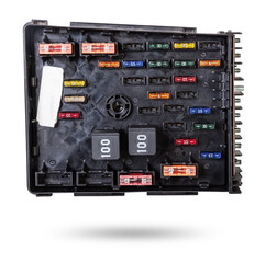 Automotive fuses on a white panel with holders and multi-colored markings - a protective device that opens the electrical circuit when the rated current in the circuit is exceeded. Electrical Repair.