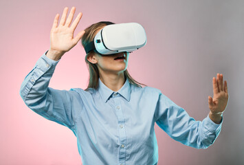 Virtual reality headset, metaverse and futuristic tech, young woman on pink background, AI and user...